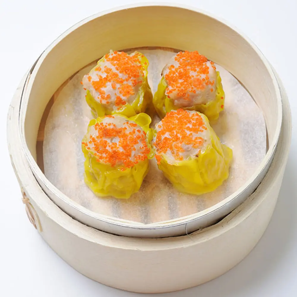 Four yellow - skinned shaomai with caviar at Easy Joy Hot Pot Dim Sum Buffet，a Chinese Restaurant in New York