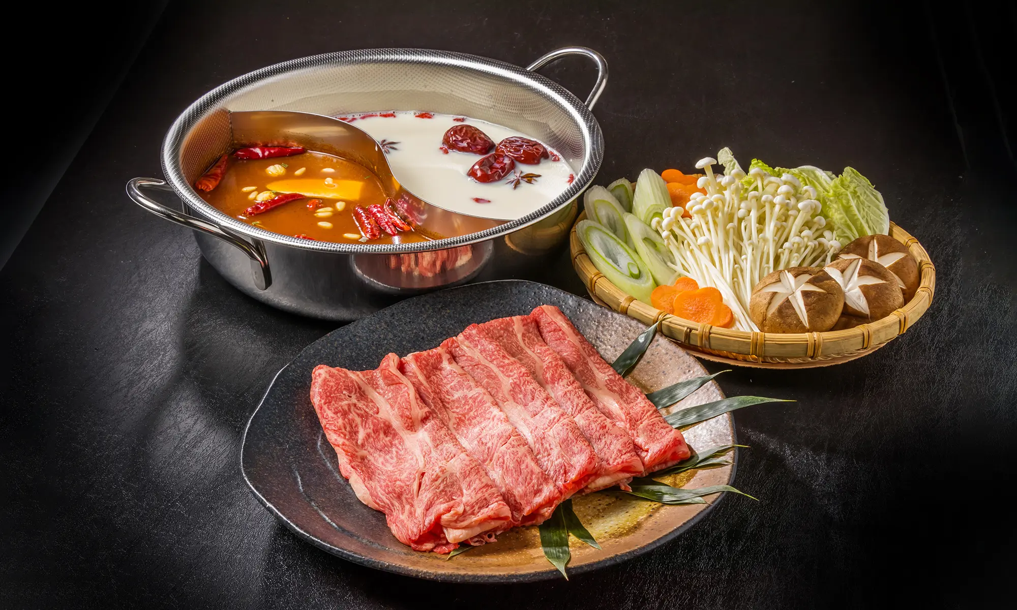 Hot pot with two broths and fresh ingredients at Easy Joy Hot Pot Dim Sum Buffet，a Chinese Restaurant in New York